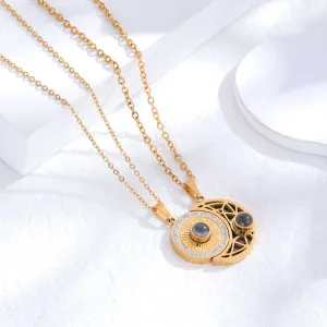 Gold sun and moon projection matching necklaces for couples